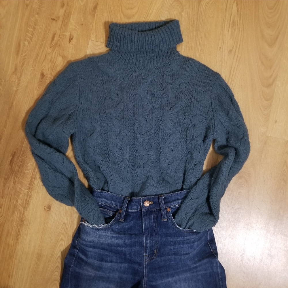 muted blue cable knit turtleneck sweater